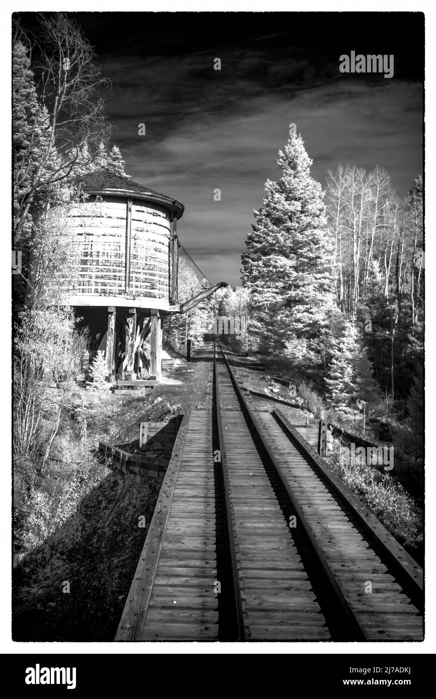 Water Tower sulla ferrovia a scartamento ridotto Foto Stock