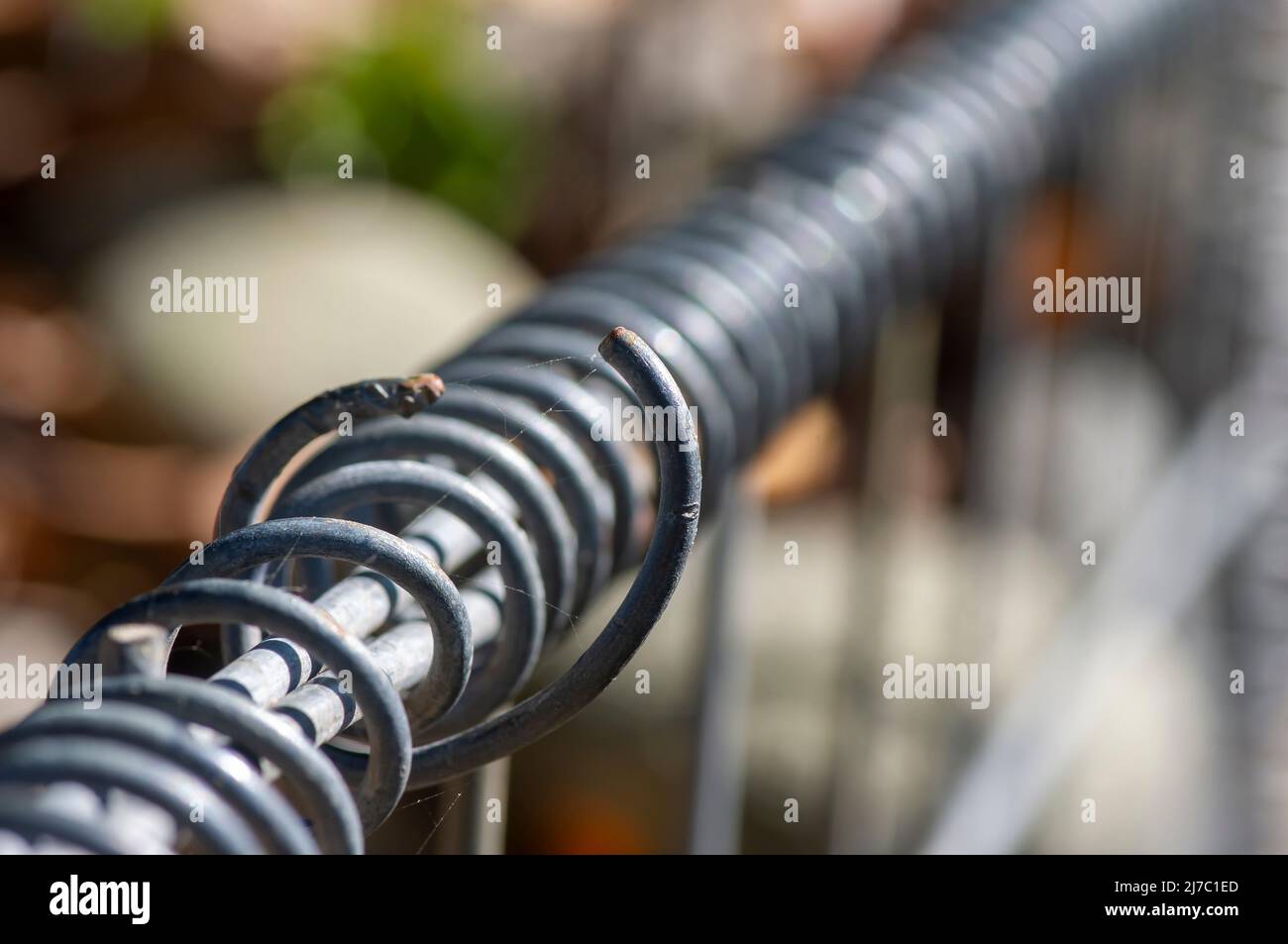 Asta metallica ritorta a fuoco poco profondo Foto Stock