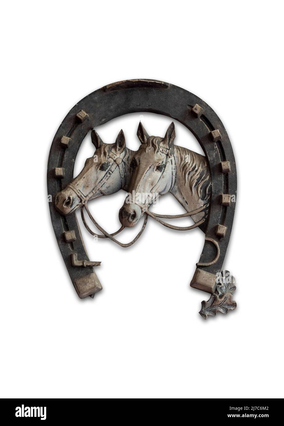 decorazione a parete in forma di due teste di cavallo isolato sfondo bianco Foto Stock