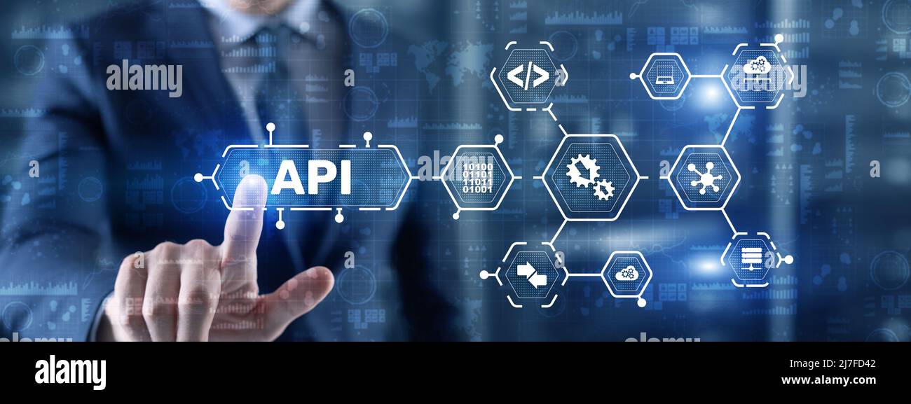 Interfaccia di programmazione delle applicazioni. Strumento di sviluppo software API. Concetto di tecnologia dell'informazione. Businessman preme l'icona di testo API su un virtuale Foto Stock