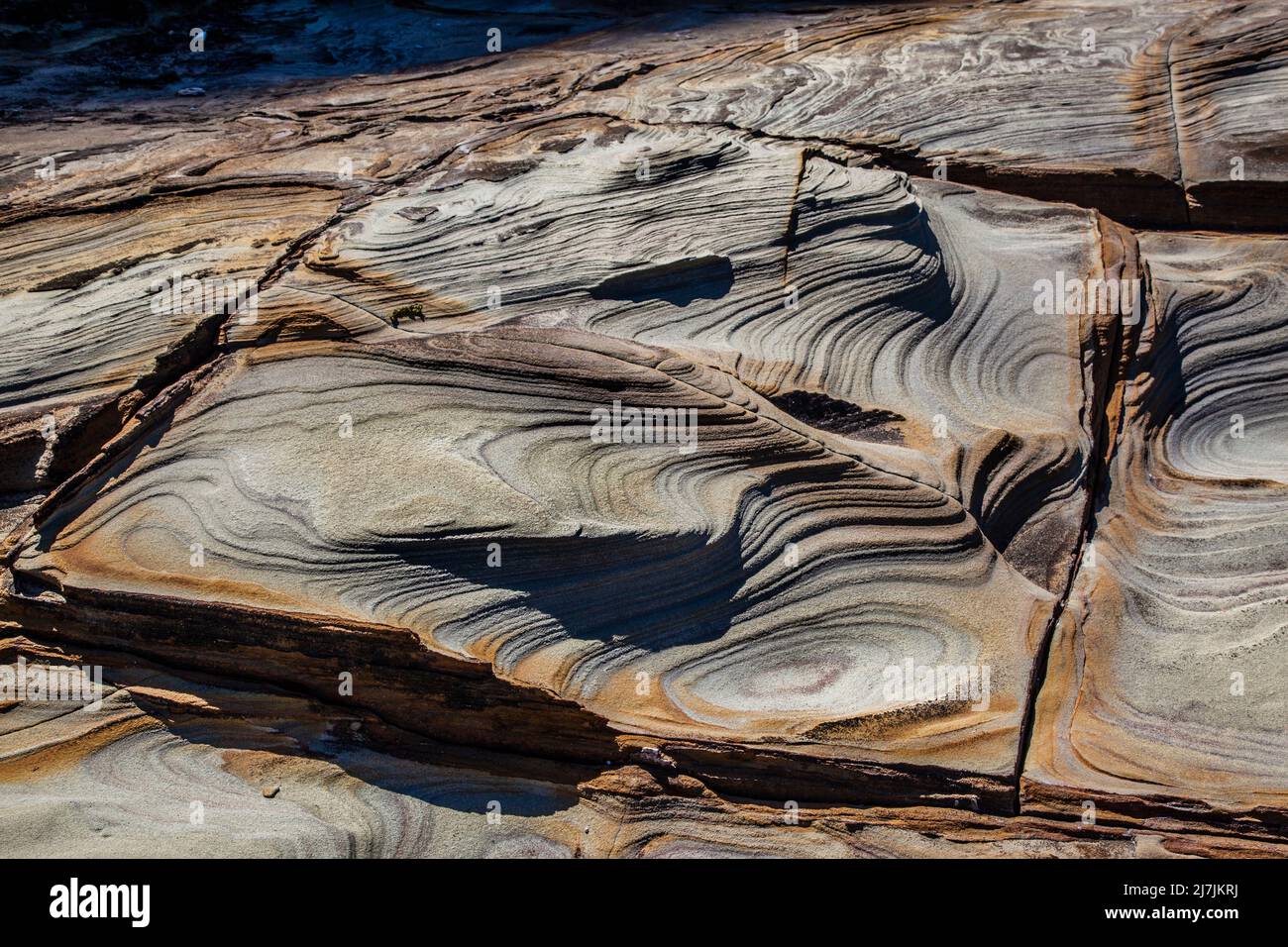 Piattaforma rocciosa tessuta a Little Beach nel Parco Nazionale di Bouddi sulla costa centrale del nuovo Galles del Sud, Australia Foto Stock