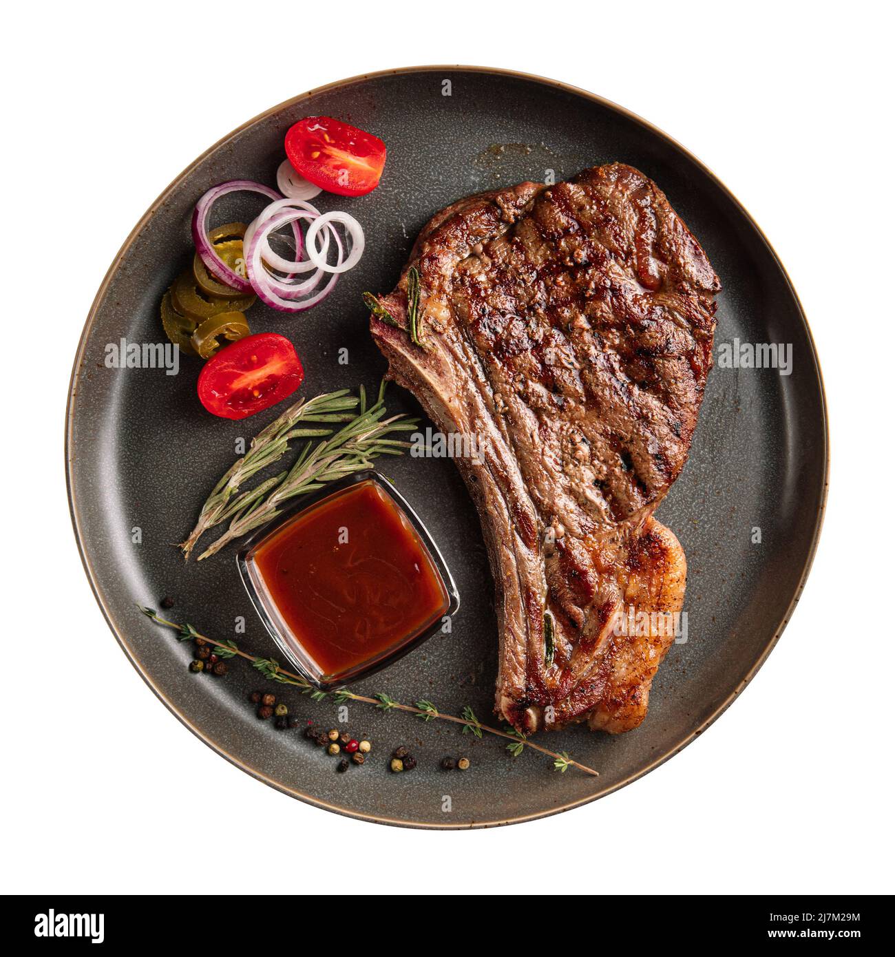 Piatto isolato di manzo alla griglia bistecca di osso Foto Stock