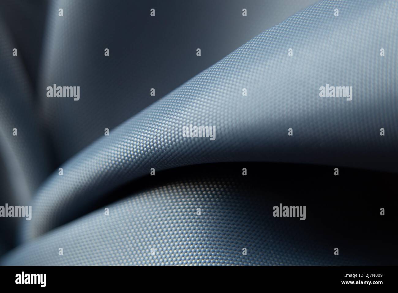 tessuto grigio di seta grinzito per foto macro di sfondo, tessuto per sfondo Foto Stock