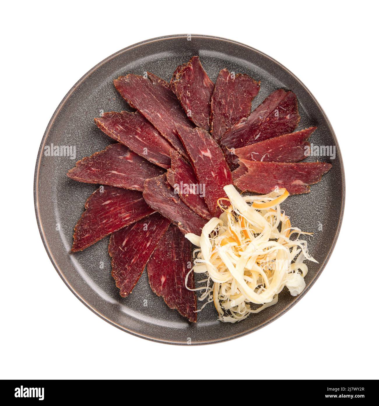 Porzione isolata di antipasto di carne di cavallo secco Foto Stock