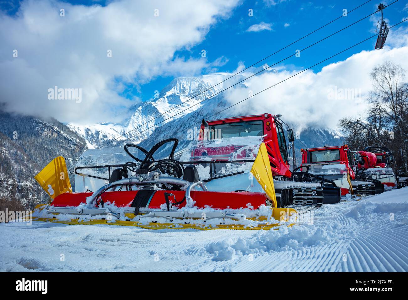 Snow groomers - macchine rackers di gatto delle nevi presso il resort Alps Foto Stock