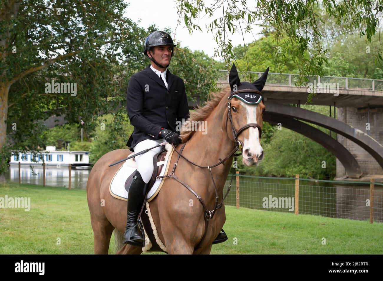 Windsor, Berkshire, Regno Unito. 12th maggio 2022. Era una giornata intensa e il sole splindeva il primo giorno del Royal Windsor Horse Show, allestita nei giardini privati del Castello di Windsor. Credit: Maureen McLean/Alamy Live News Foto Stock