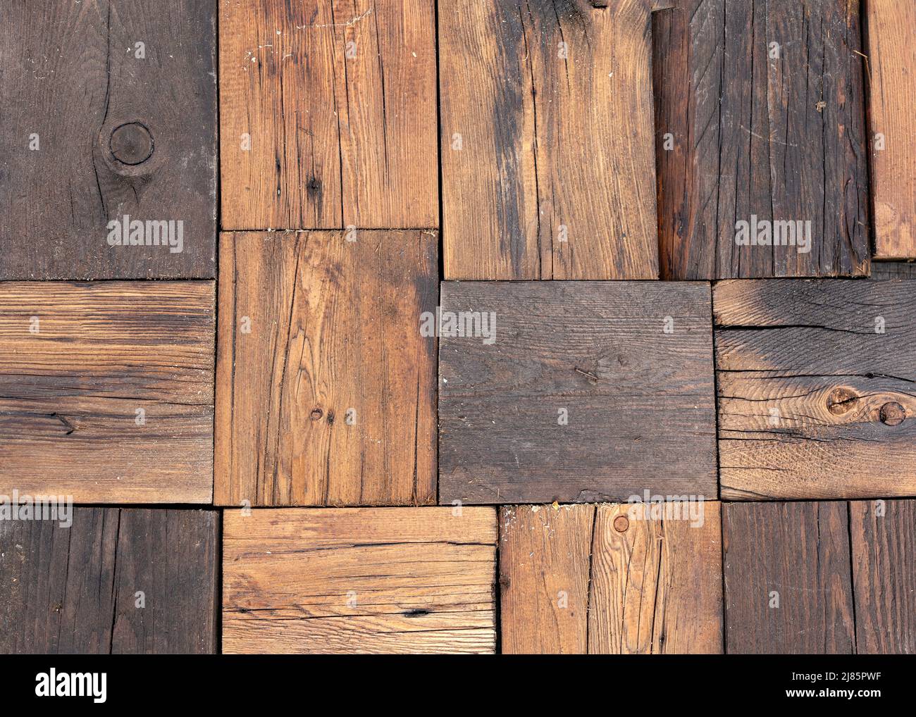 Blocchi legno variazione muro. Quadrato legno blocco sfondo texture. Primo piano Foto Stock