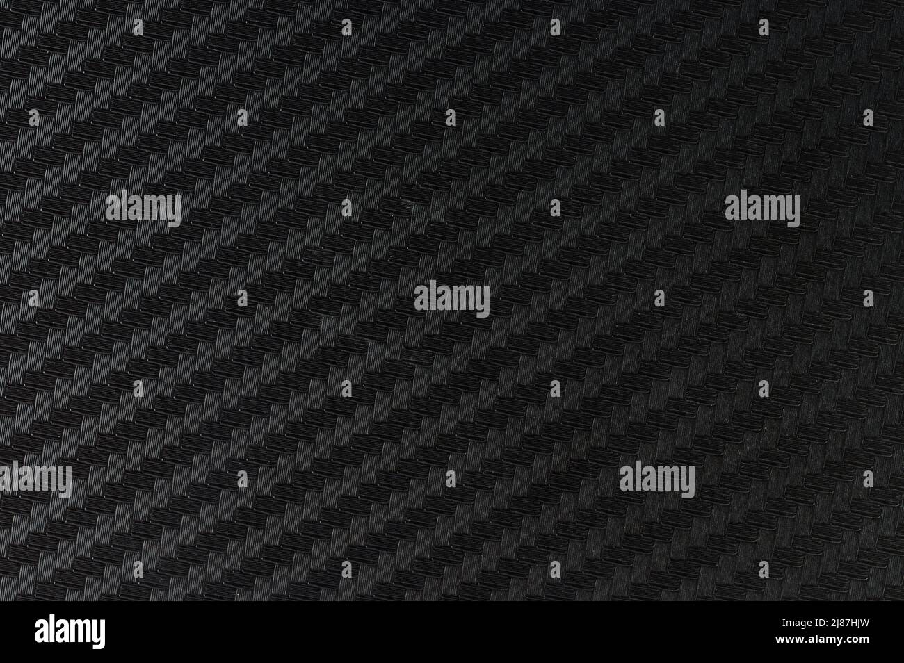 Griglia di texture in carbonio, vista ravvicinata di colore nero Foto Stock