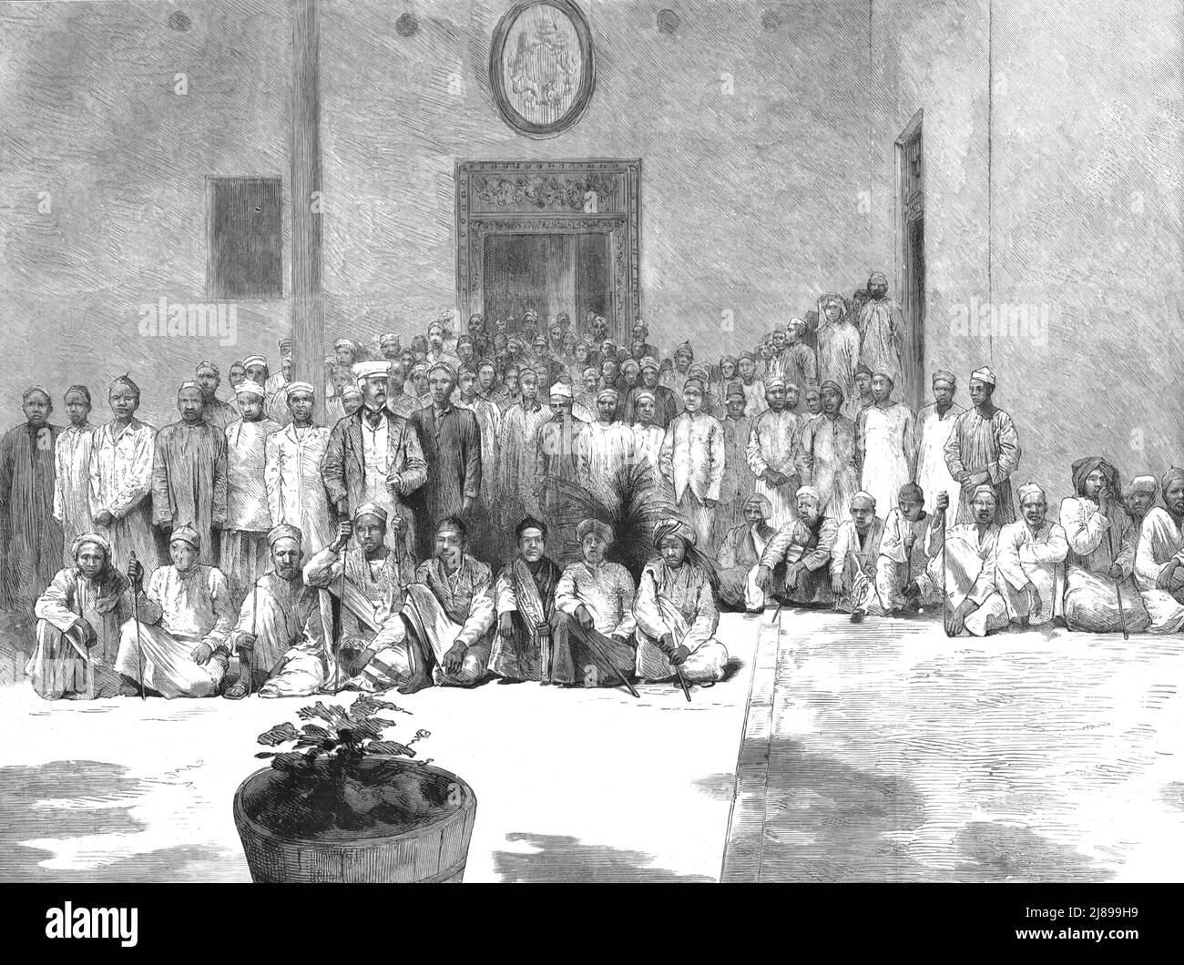 'Mr. Il ritorno di H. M. Stanley alla civiltà; il Sig. Stanley e i suoi Porters presso la British Agency, Zanzibar. Foto Stock