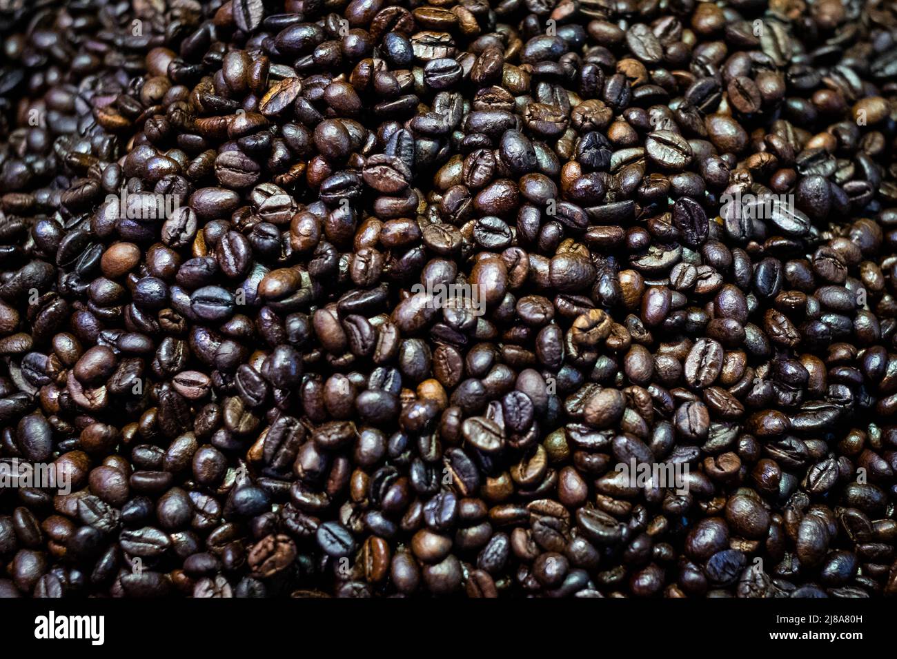 primo piano dei chicchi di caffè, fondo del caffè Foto Stock