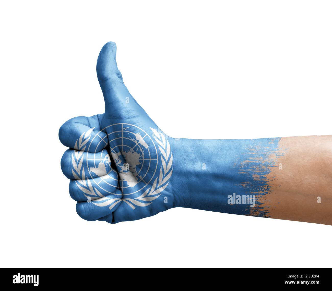 Mano che fa pollice su dipinto con la bandiera delle nazioni unite Foto Stock