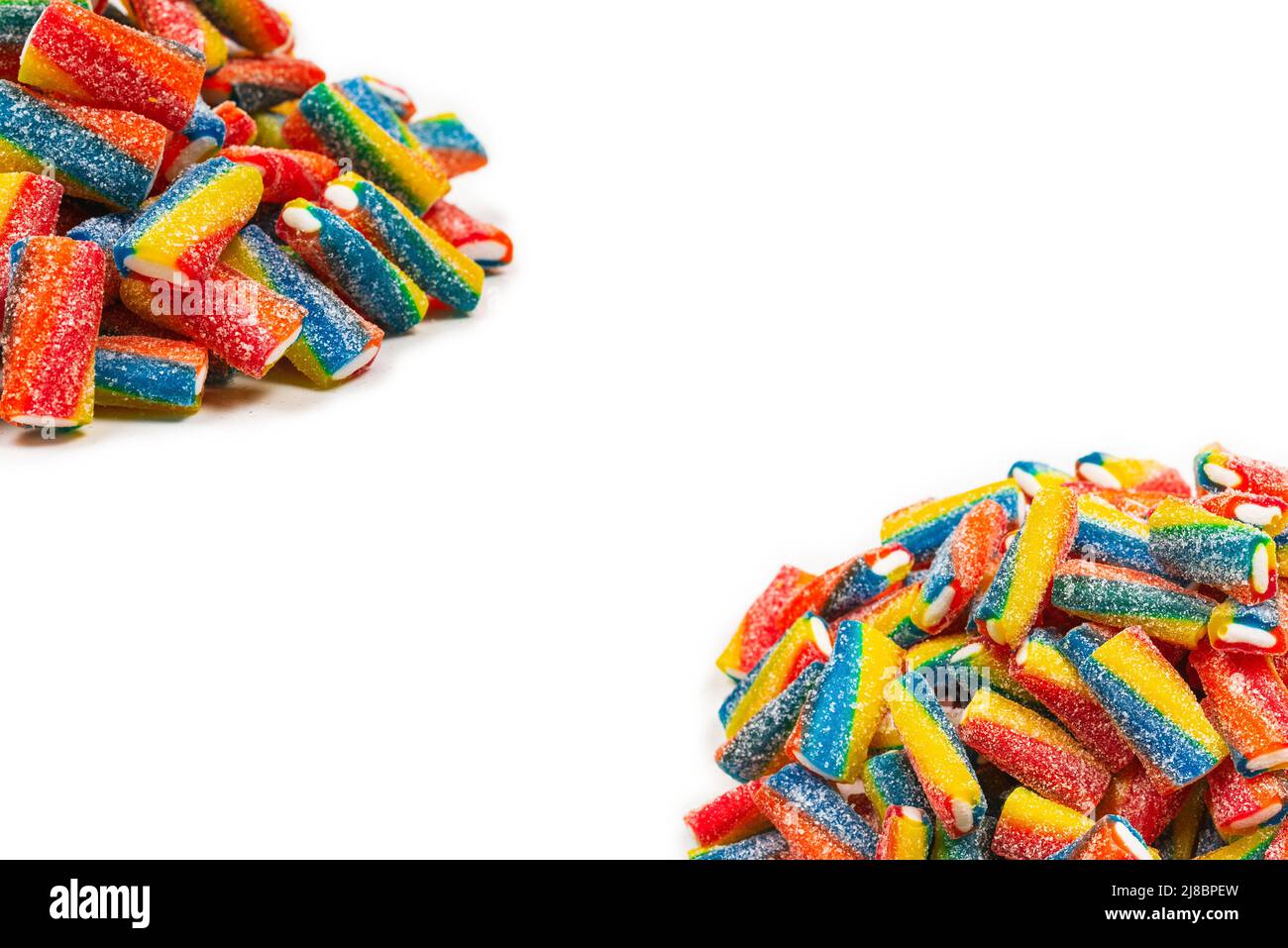 Tubi colorati, caramelle in gelatina. Vista dall'alto. Foto Stock