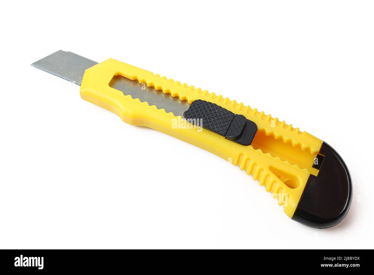 Coltello da taglio giallo isolato su sfondo bianco. Lama di servizio estesa Foto Stock