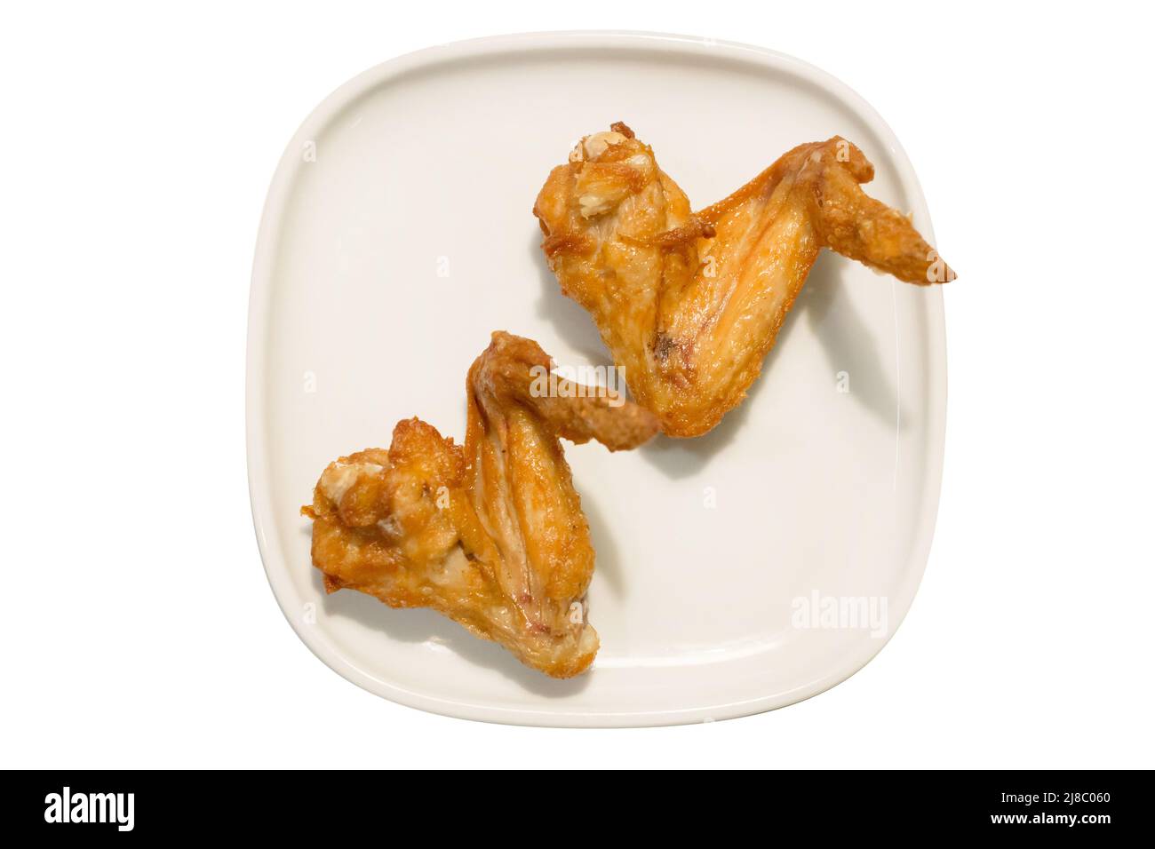 Filare le ali di pollo fritte, su un piatto bianco isolato bianco. Foto Stock