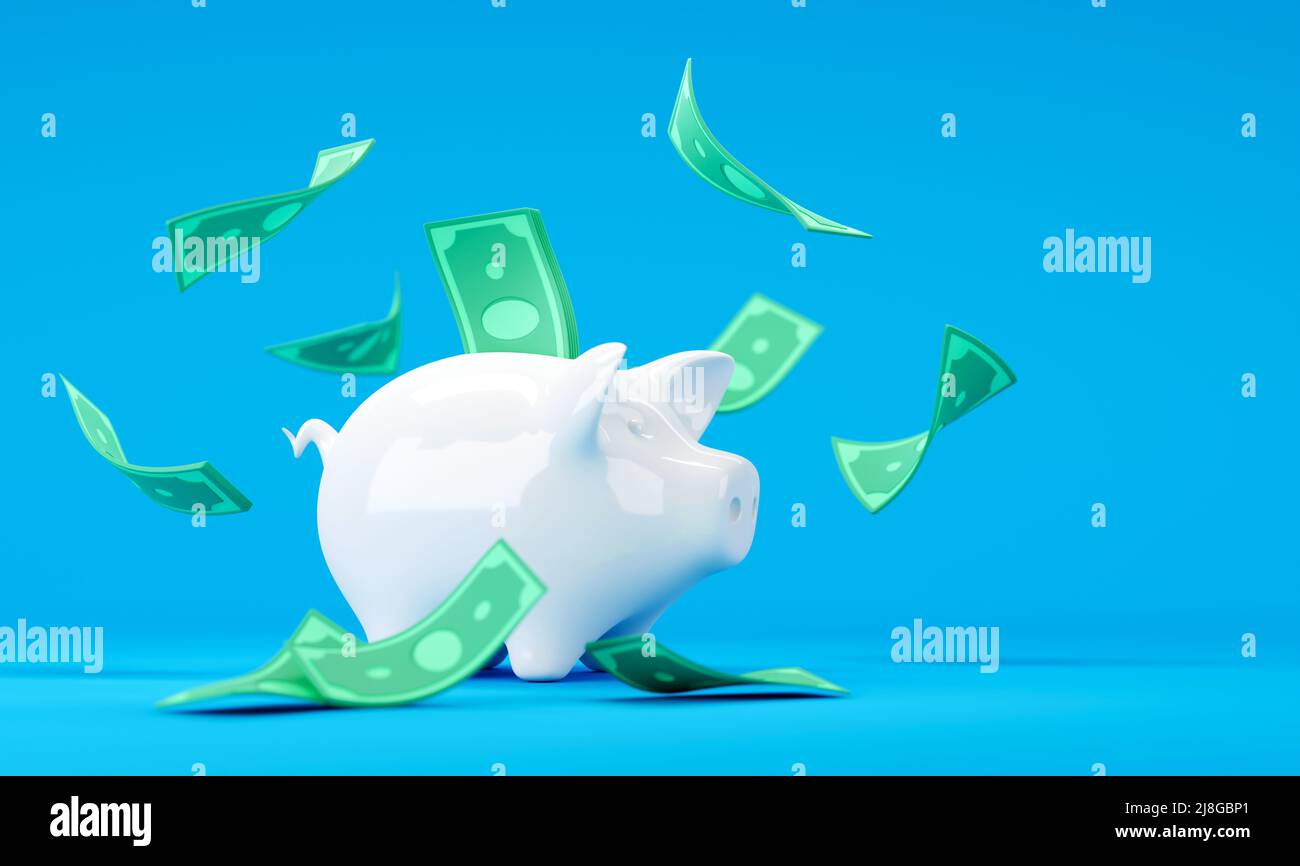Banca bianca del piggy con le fatture cadenti del dollaro su sfondo blu Foto Stock