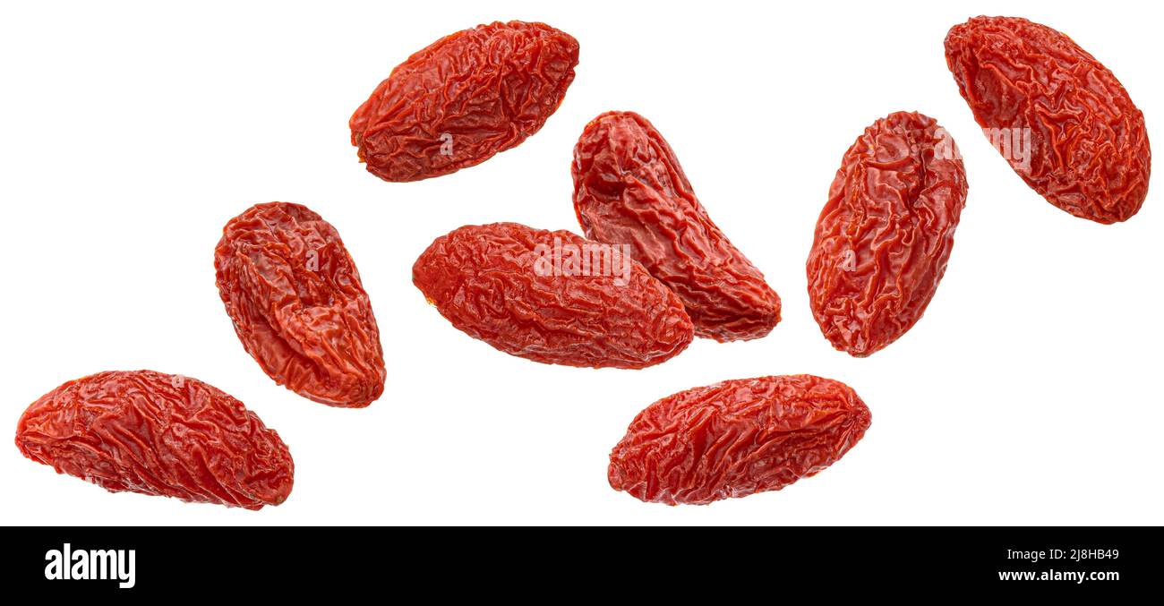 Caduta bacche di goji essiccato isolato su sfondo bianco Foto Stock