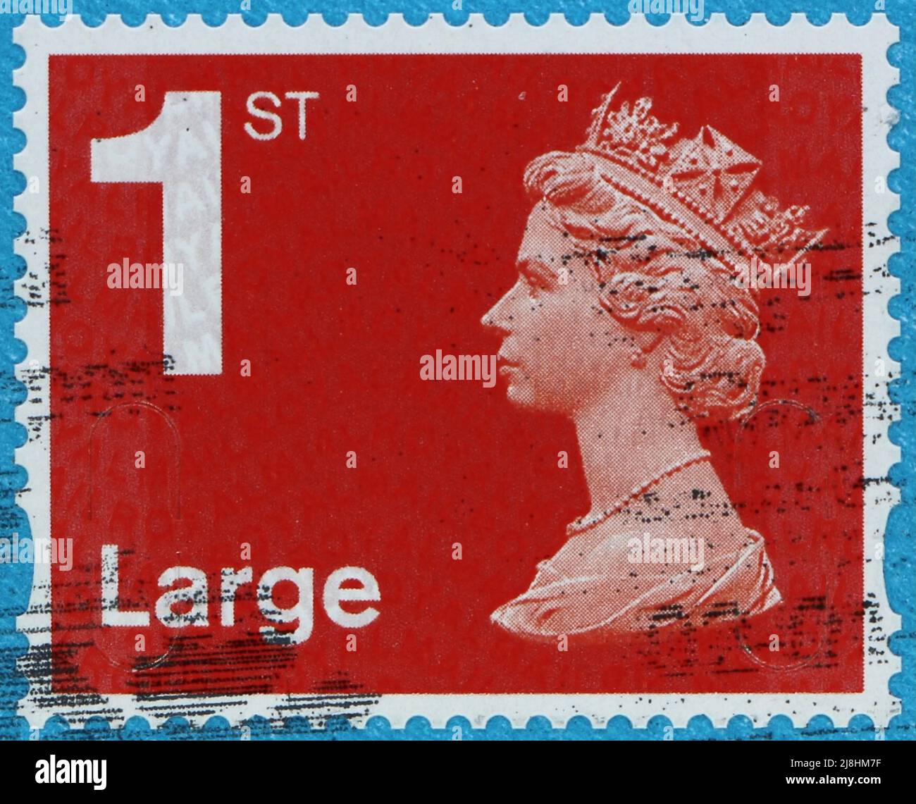 Foto di un francobollo rosso britannico con la regina Elisabetta II grande 1st Foto Stock