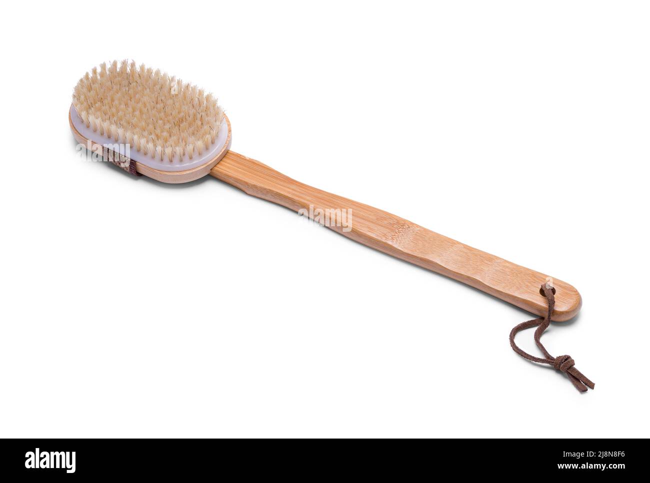 Spazzola Scrub Broccing sul retro della stanza da bagno tagliata su bianco. Foto Stock