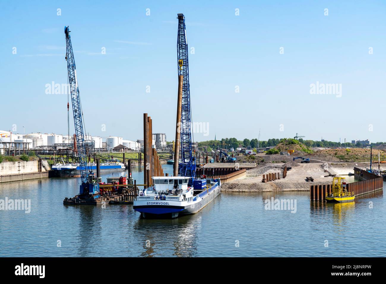 Duisport, Porto di Ruhrort, Coal Island, conversione della vecchia area portuale nel più grande terminal di container trimodale d'Europa, la bonifica terrestre Foto Stock