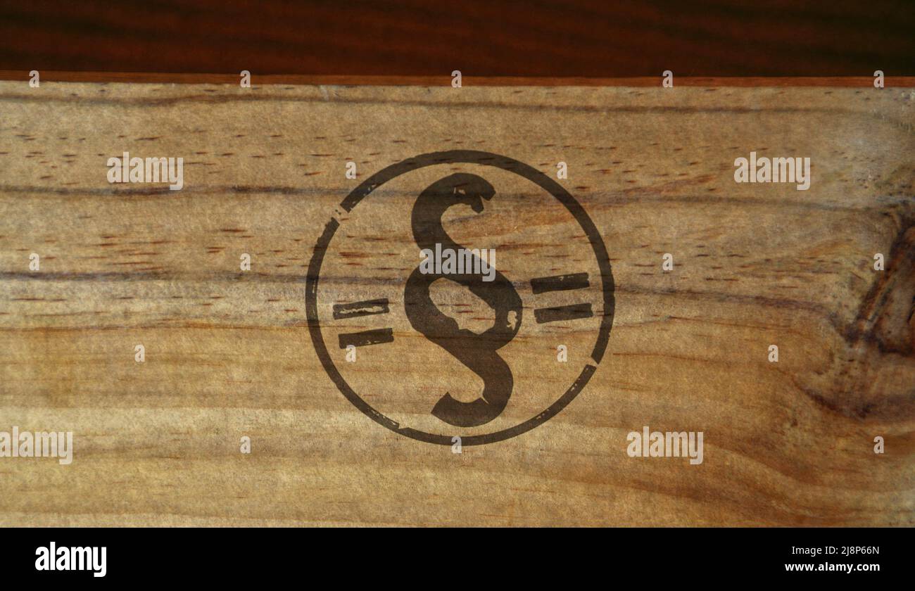 Timbro paragrafo stampato su scatola di legno. Legge, giustizia e legislazione regola simbolo concetto. Foto Stock