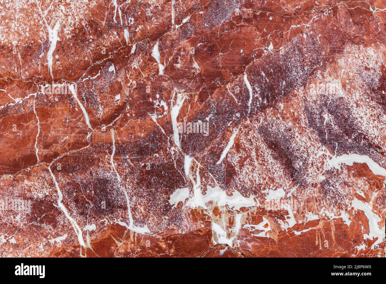 Motivo in marmo rosso naturale. Texture naturale della foto di sfondo. Vista frontale Foto Stock