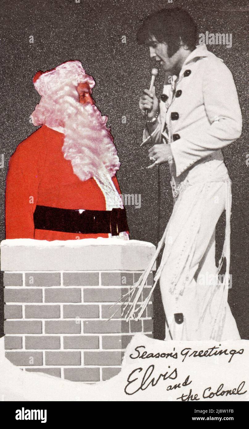 Elvis Presley e il colonnello Tom Parker, in posa per una carta di Natale,  circa 1971. Riferimento file n. 34145-832THA Foto stock - Alamy