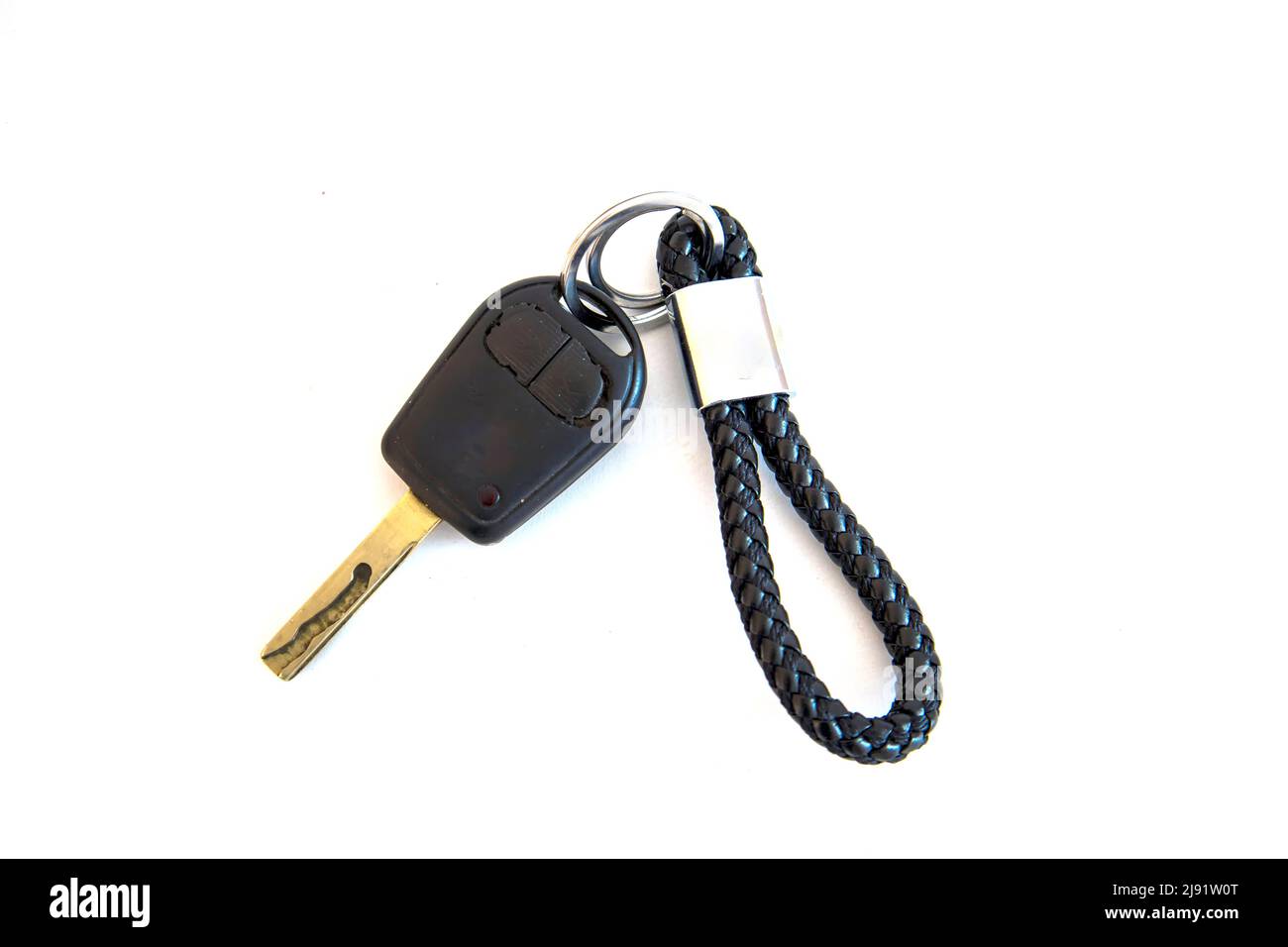 Chiave per auto con portachiavi isolato su bianco Foto Stock