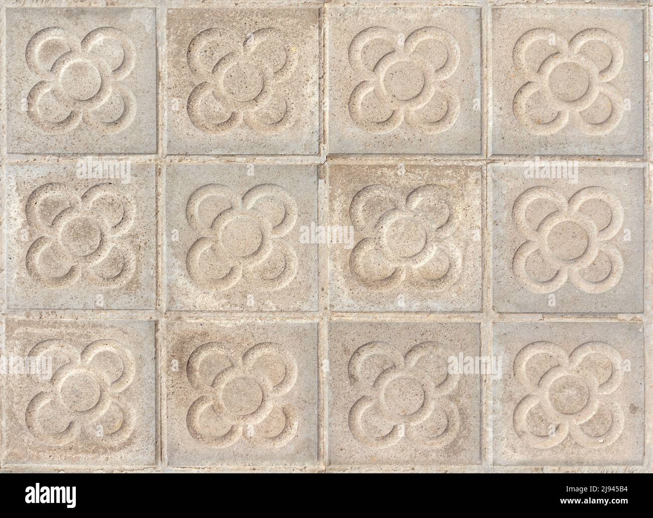 Piastrelle di pavimentazione Barcellona con fiore, lastre di panot con simbolo texture vista dall'alto Foto Stock