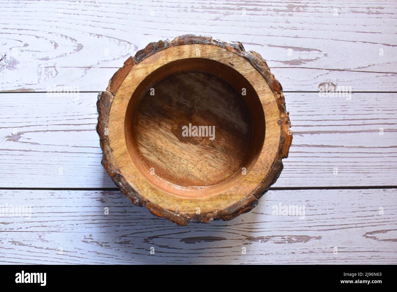 Colore marrone vuoto piatto rotondo rustico di legno di legno di teak Foto Stock