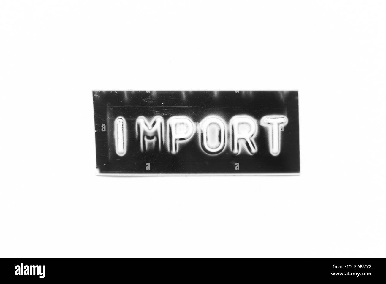 Banner di colore nero con lettera in rilievo e importazione di parole su sfondo bianco Foto Stock