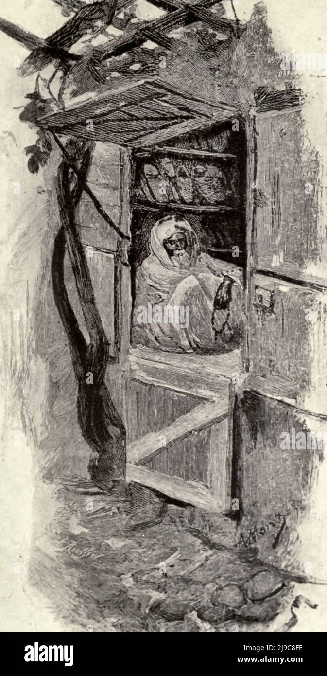 Un mercante di Slipper in Marocco, circa 1910 Foto Stock