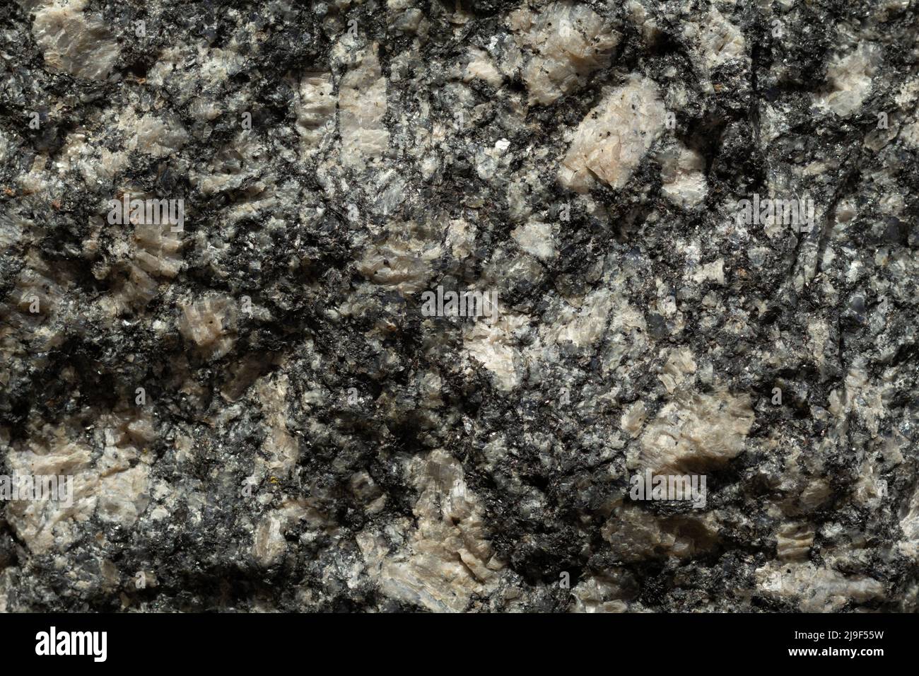 Texture di marmo nero con macchie bianche. Disegno astratto di sfondo in marmo per il design. Foto Stock