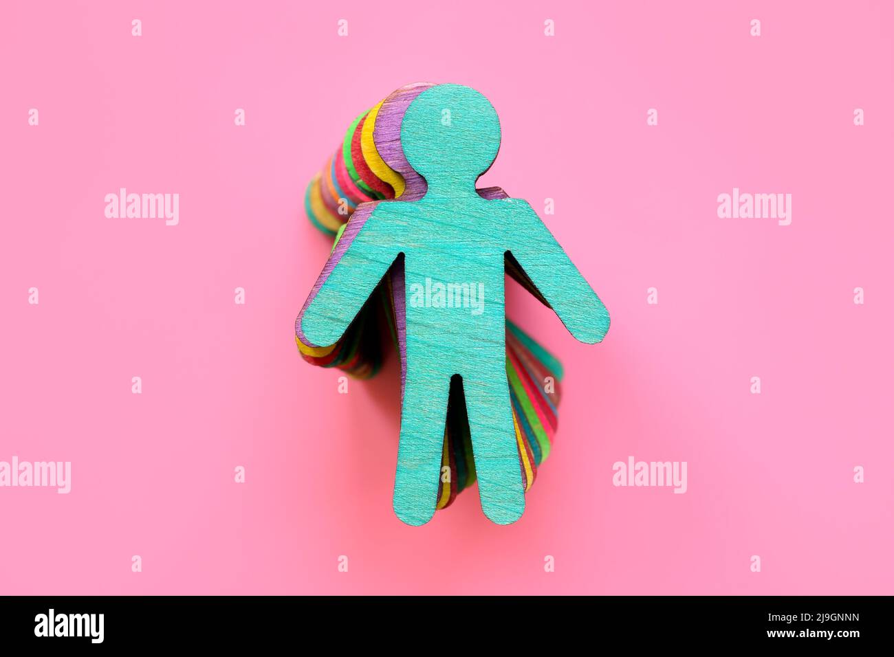 Una colonna di figure colorate come simbolo di diversità. Foto Stock Una colonna di figure colorate come simbolo di diversità. Foto Stock