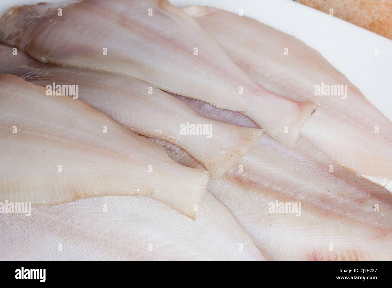 Un gruppo di pesce fresco macinaceo pulito e crudo. Sano fresco. Foto Stock