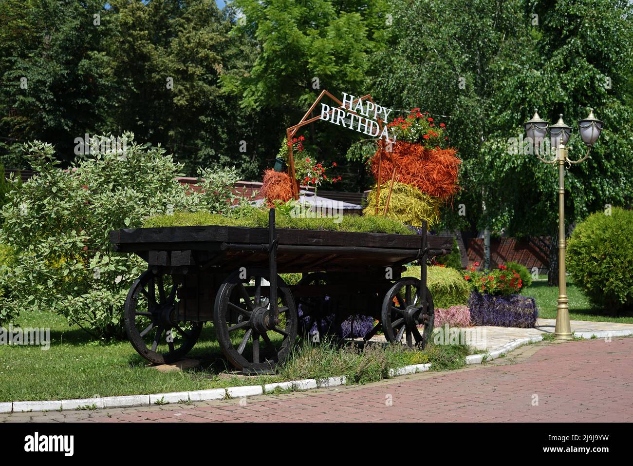 Vintage cart come parte del design dell'area fotografica del parco. Foto Stock