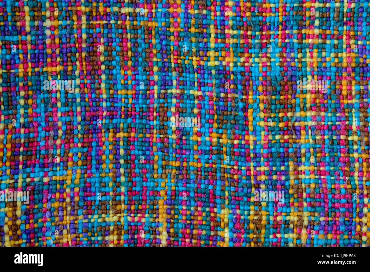 Primo piano di tessuto di lana multicolore. Foto Stock