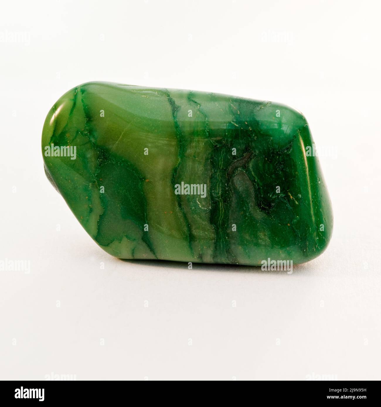Macro primo piano Fotografia a colori di un ' Buddstone ' lucido una gemma di cristallo semi-preziosa usata nella terapia di guarigione del cristallo Foto Stock