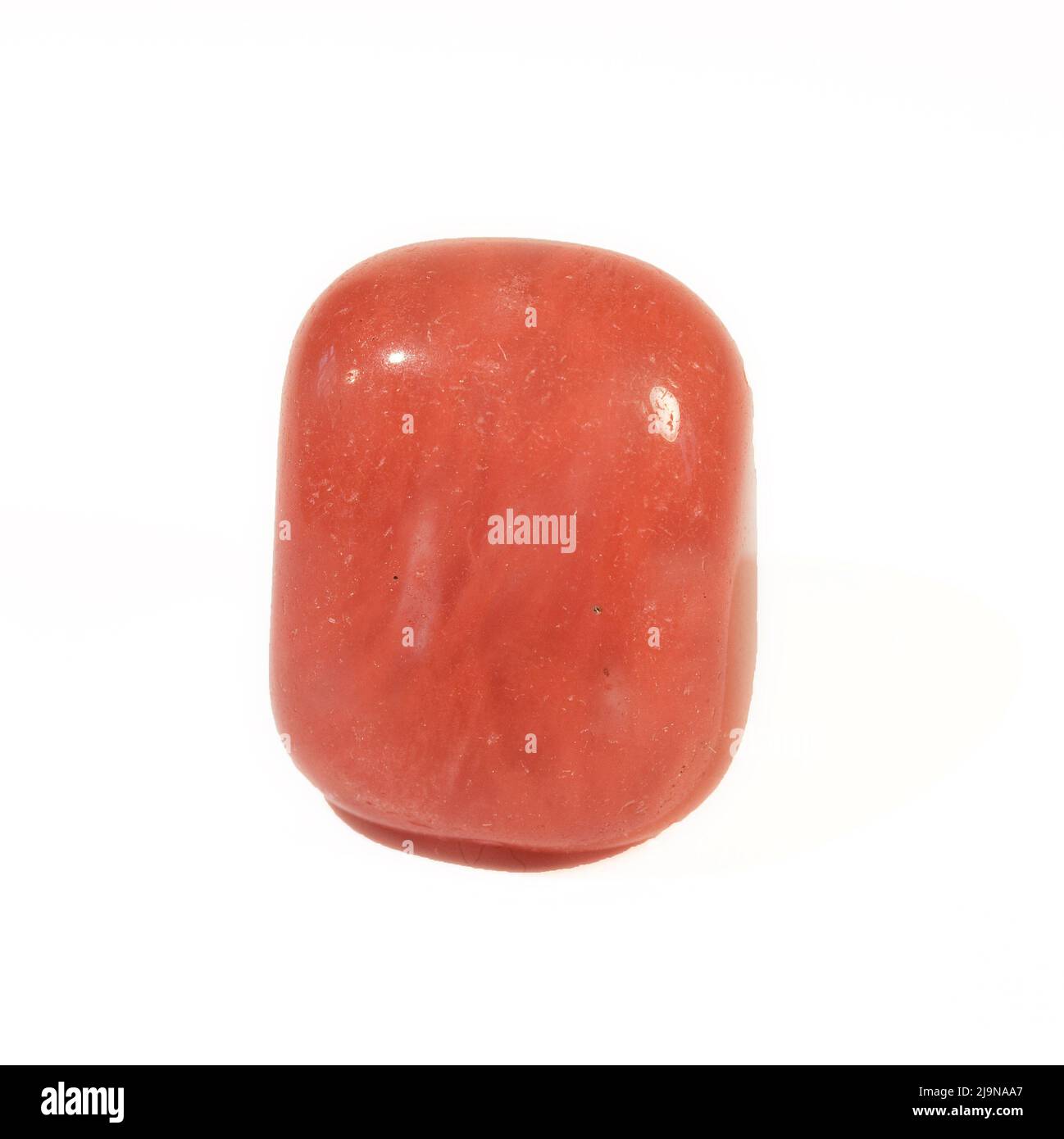 Macro primo piano Fotografia a colori di 'Cherry Quartz' una gemma di cristallo semi preziosa usata nella terapia di guarigione del cristallo Foto Stock