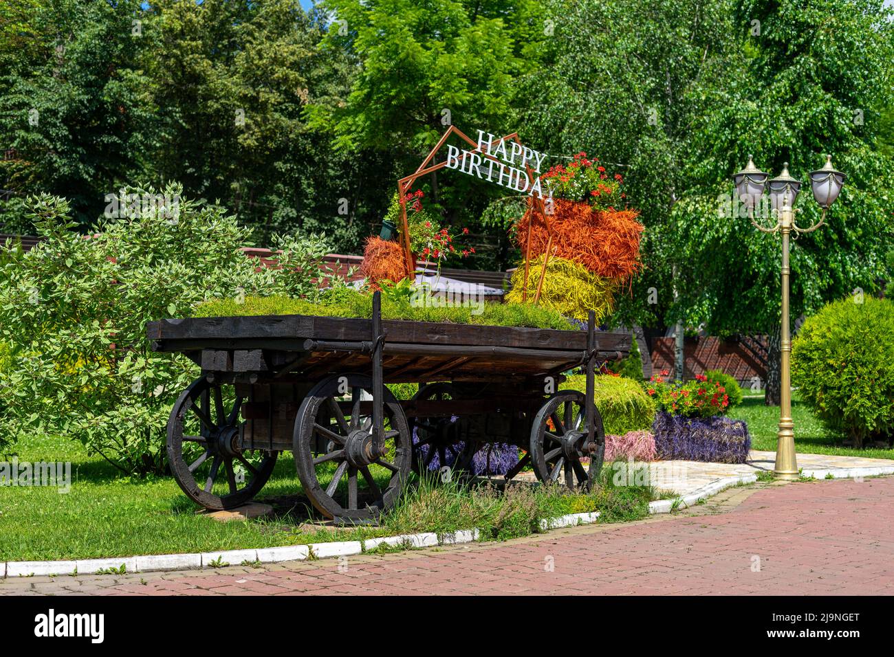 Vintage cart come parte del design dell'area fotografica del parco Foto Stock