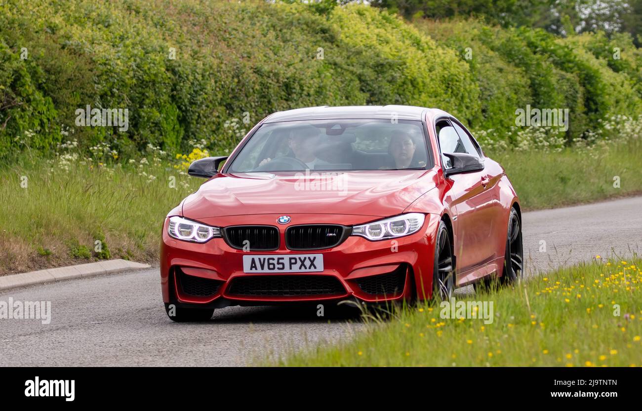 2015 arancione 2979 cc BMW M4 Foto Stock