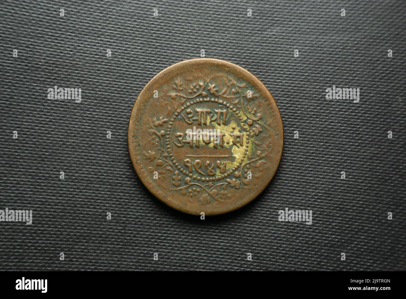 Mezza moneta indiana Anna datata 1944 India, vista frontale Foto Stock