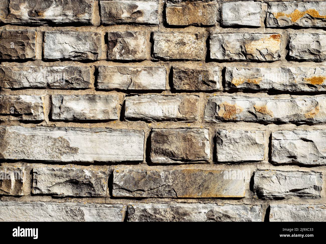 sfondo o texture orizzontale pietra fronte mattone Foto Stock