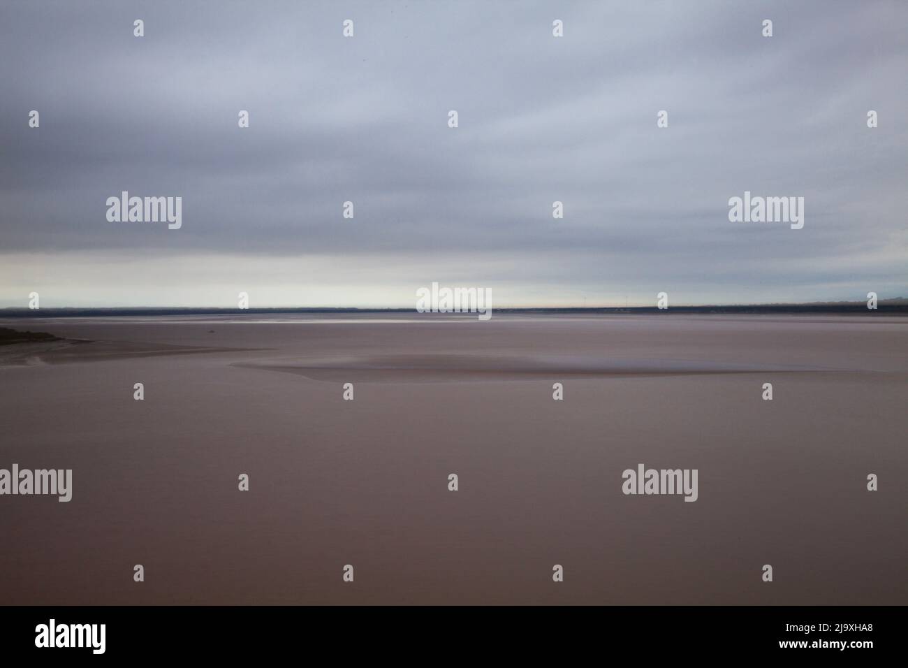 Foto lunga esposizione di mare dell'estuario di Humber, Regno Unito Foto Stock