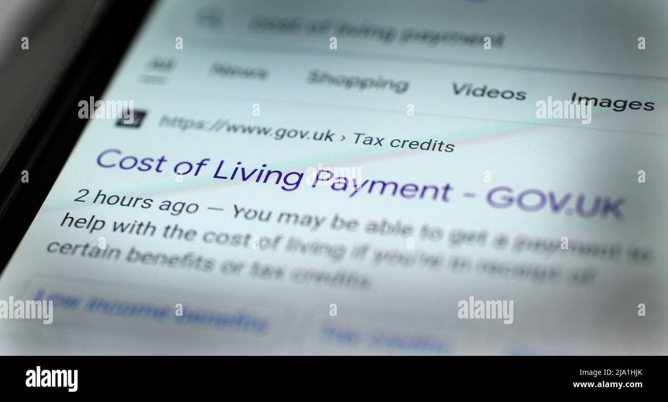 COSTO DEL GOVERNO DI VIVERE INFORMAZIONI DI PAGAMENTO SULLO SCHERMO DELLO SMARTPHONE RE COSTO DELLA VITA CRISI CARBURANTE BOLLETTE ELETTRICITÀ GAS BENEFICI PACCHETTO DI SUPPORTO ECC UK Foto Stock