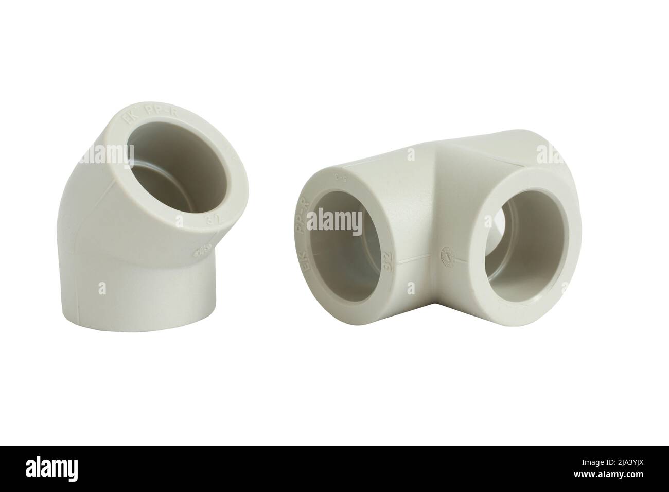 Valvole per impianto idraulico isolate su sfondo bianco. Materiale - plastica. Primo piano Foto Stock