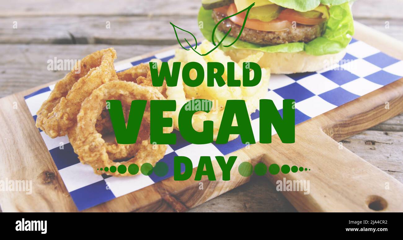 Immagine del testo del giorno vegano mondiale sull'hamburger fresco Foto Stock