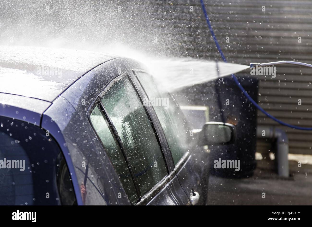 Tubo per lavaggio auto a pressione, igiene e disinfezione Foto Stock