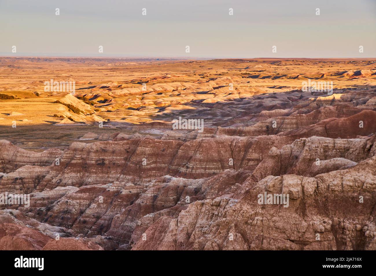 Badlands del South Dakota come il sole si riempie di canyon Foto Stock