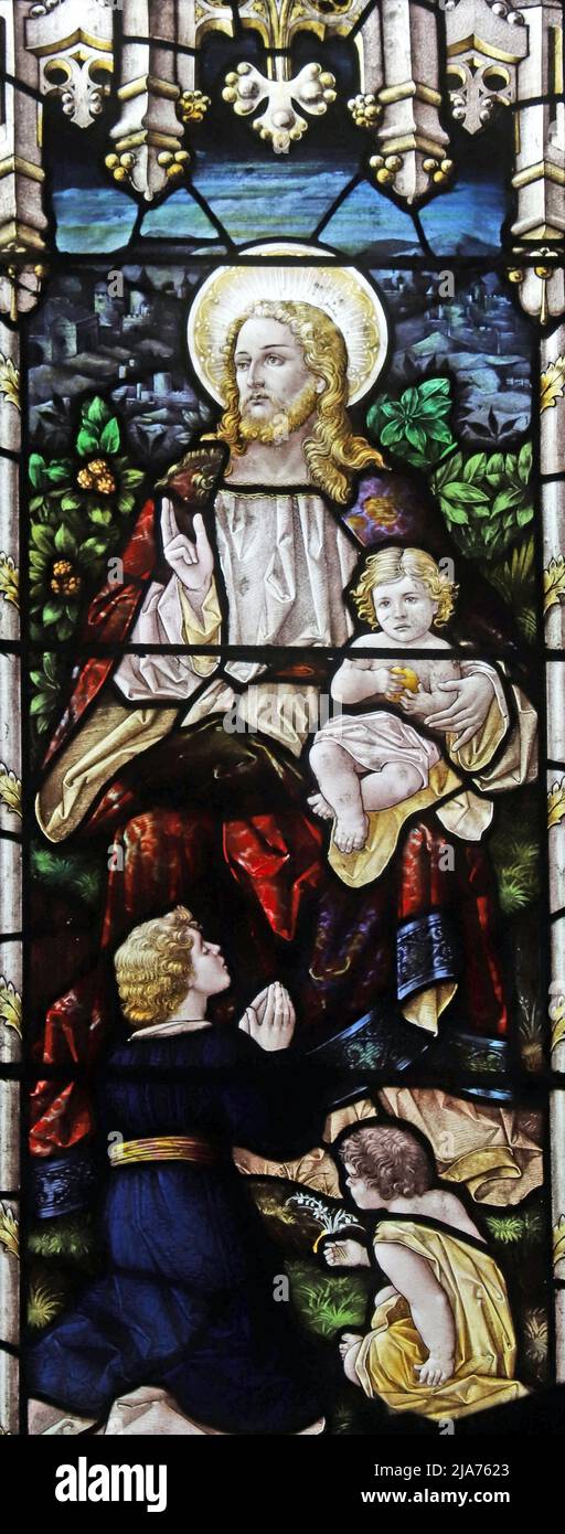 Vetrata di Percy Bacon & Brothers raffigurante Cristo benedicente bambini, Repton Chiesa, Derbyshire Foto Stock