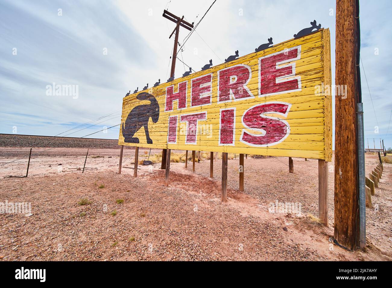 Annuncio per Jack Rabbit Trading Post sulla Route 66 che legge qui è Foto Stock